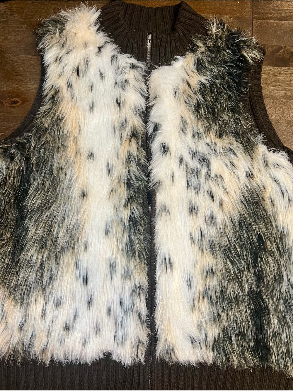 Barely worn faux fux vest with zip up front. Excellent condiotion